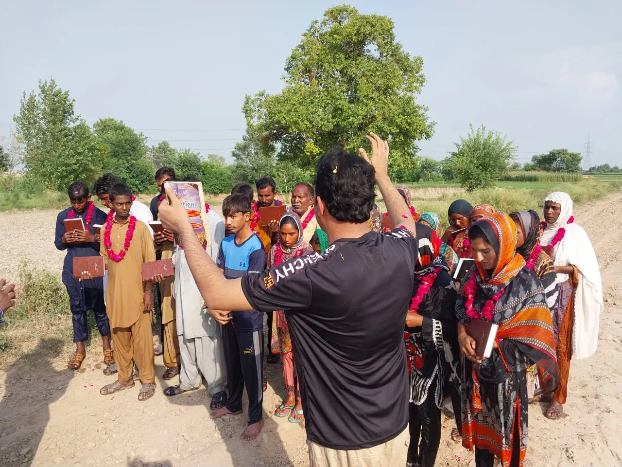 Baptism ceremony of 20 new believers