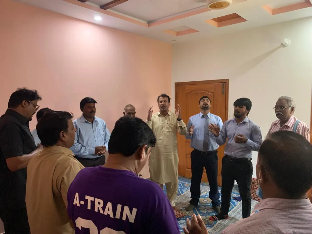 Pastors praying together